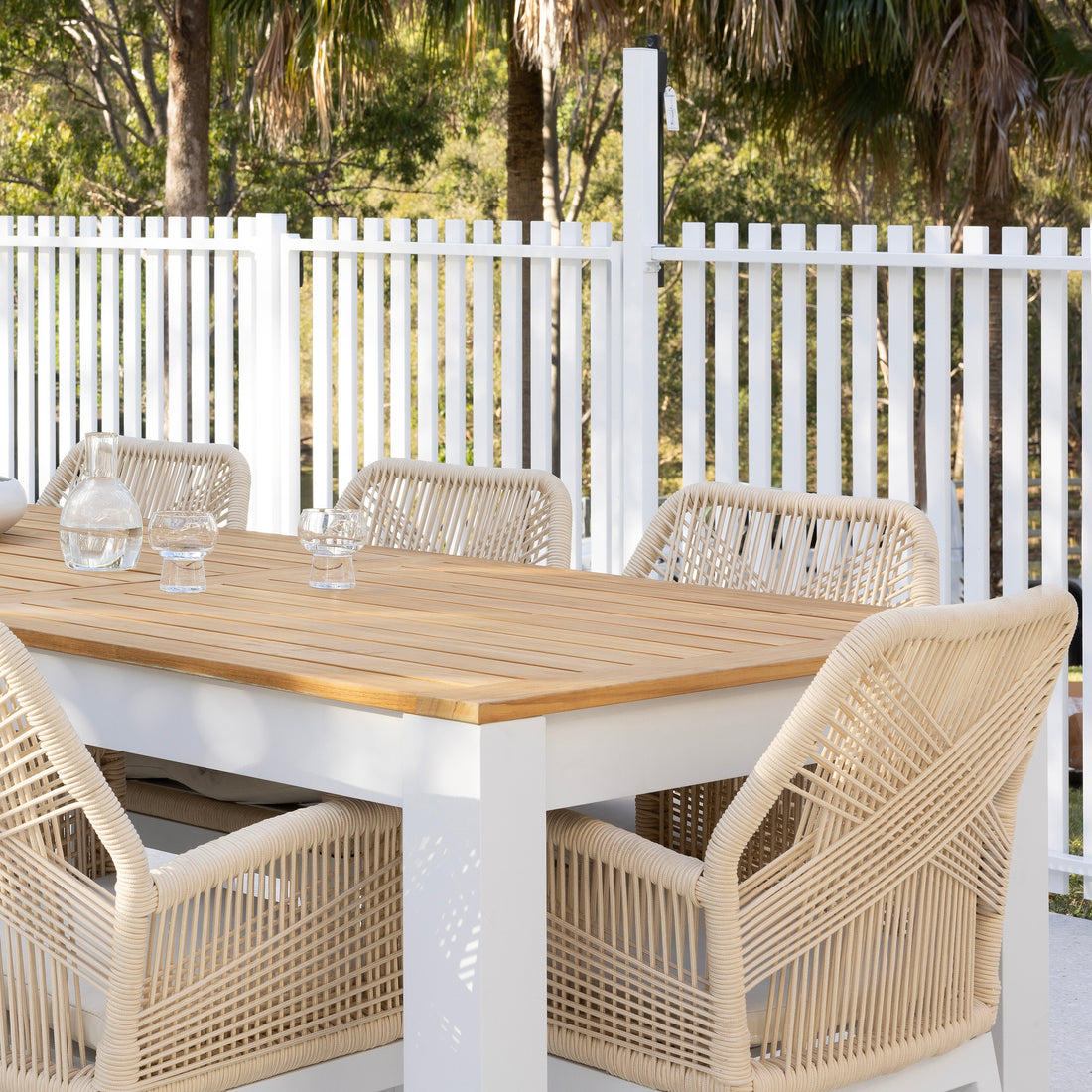 a durable timber wicker outdoor table setting